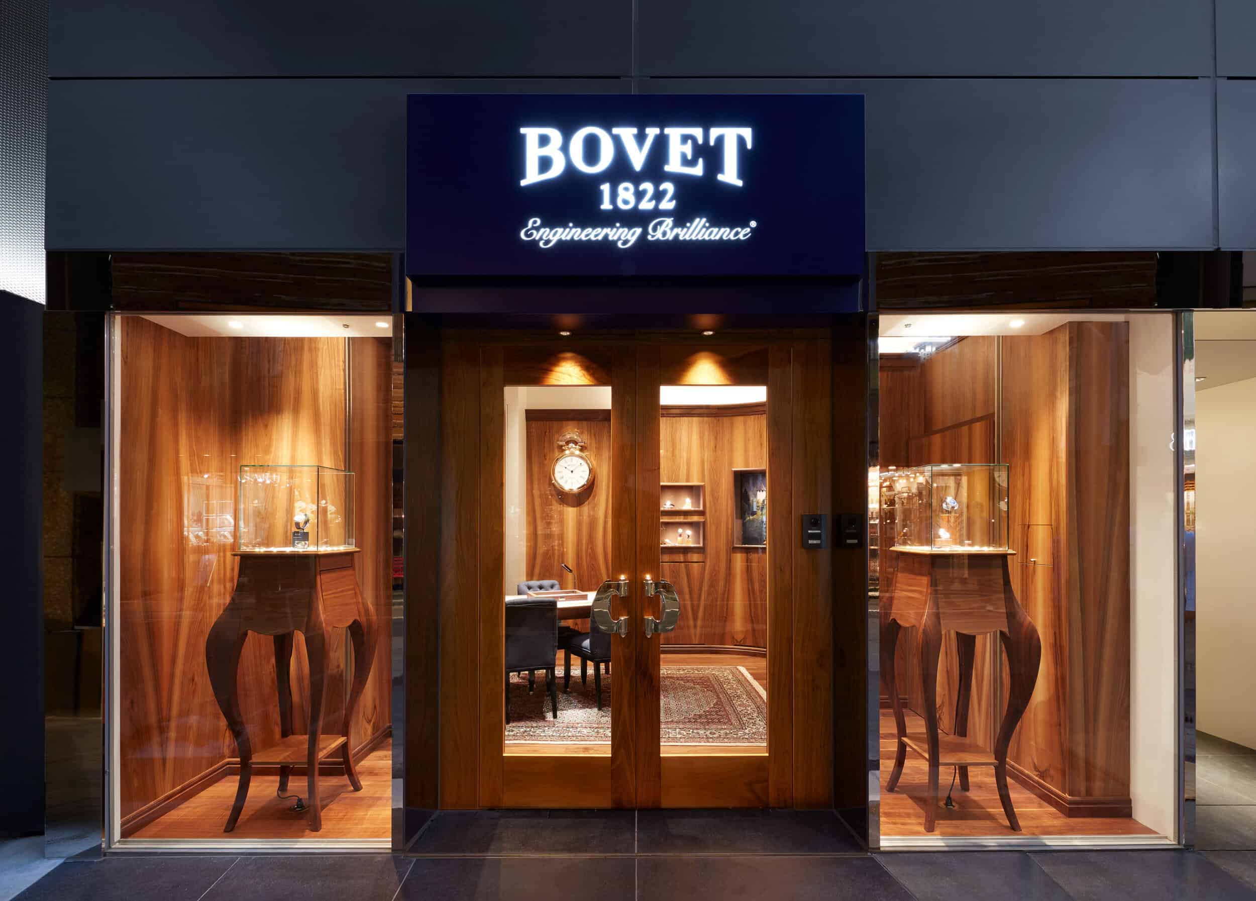Elegant Bovet boutique showcasing luxury timepieces in Tokyo storefront.