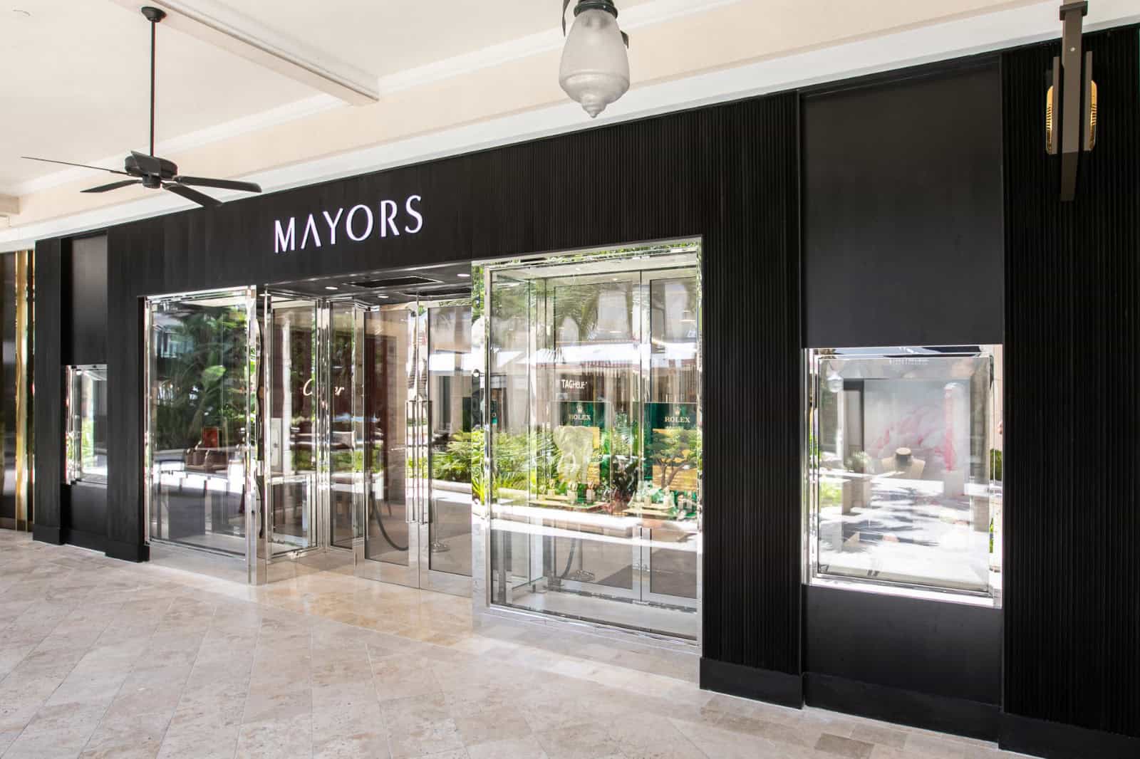 Elegant storefront of Mayors featuring Bovet timepieces displayed inside, highlighting luxury.