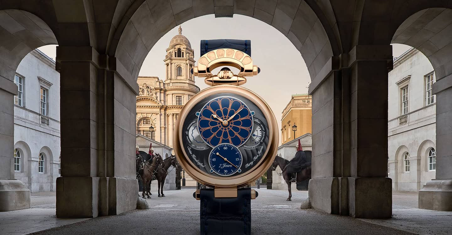 A stunning Bovet watch displayed under historic arches in an urban setting.
